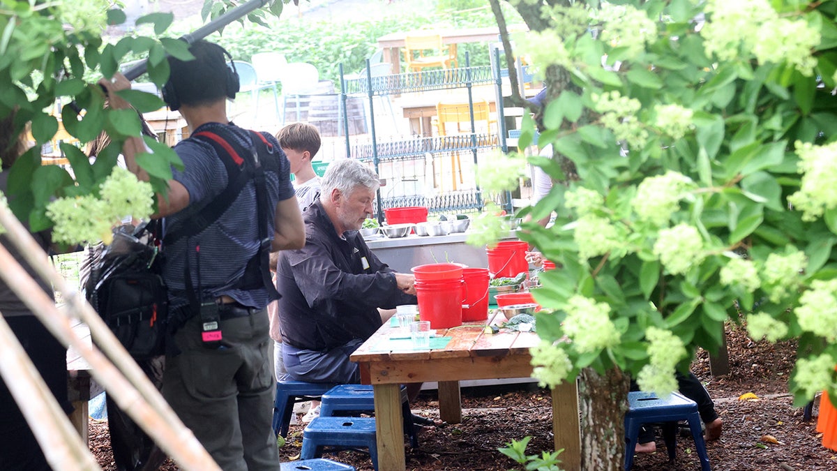 Alec Baldwin is seen looking serious at a child's play area in the Hamptons.