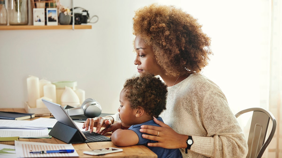 Mother with son at the kitchen table