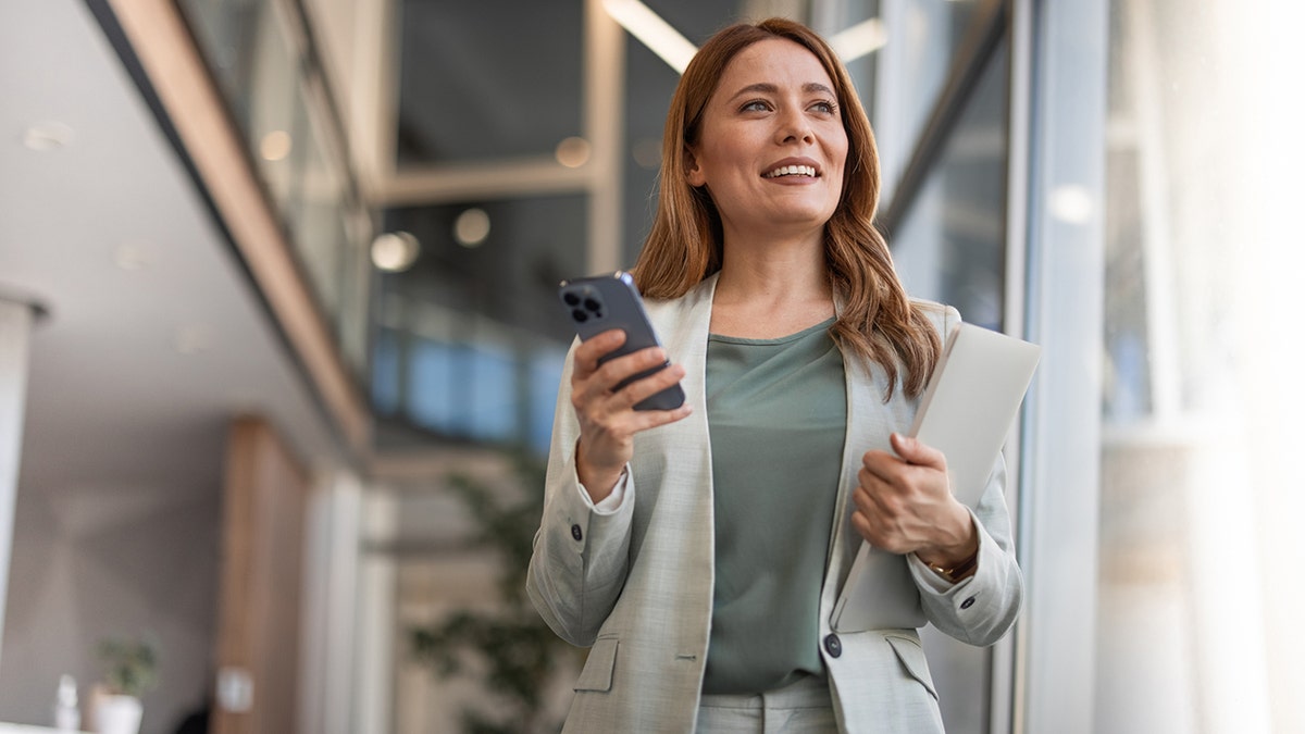 business woman managing work in an office