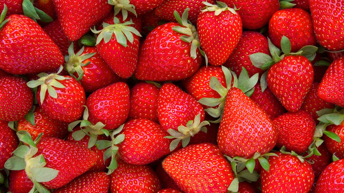 Fresh strawberries filling the frame.