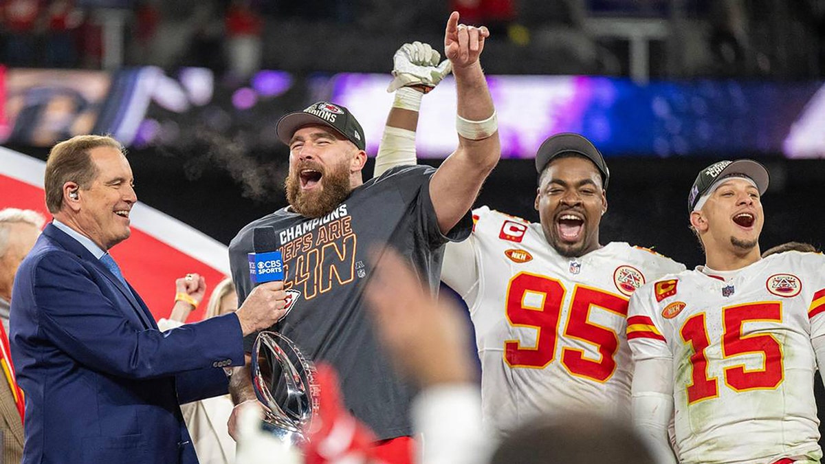 Travis Kelce, Chris Jones, and Patrick Mahomes celebrating after winning the AFC Championship