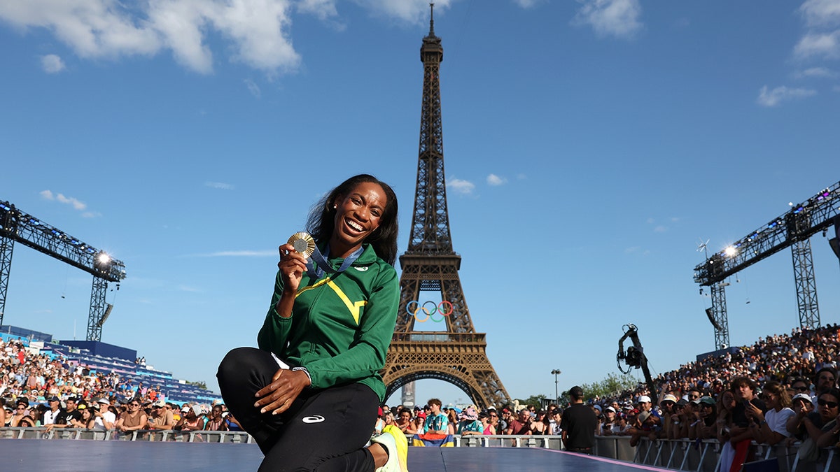 Thea LaFond in front of Eiffel tower