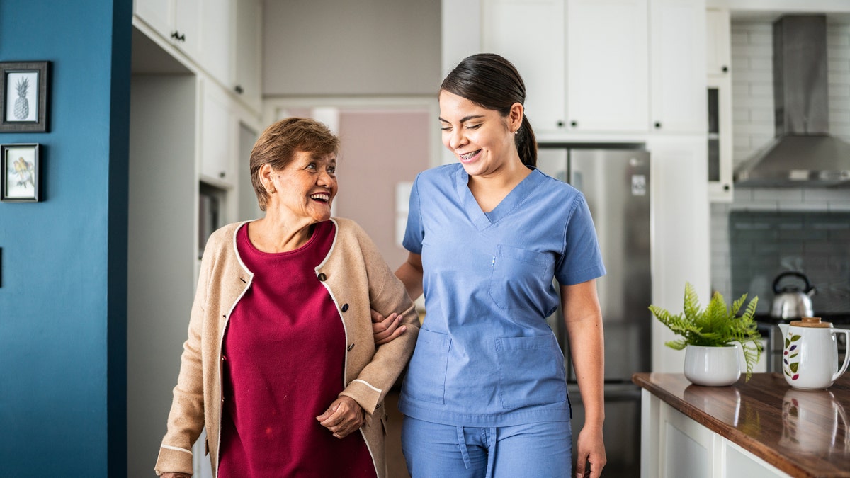 Older woman with caregiver